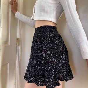 short black skirt with white polka dots